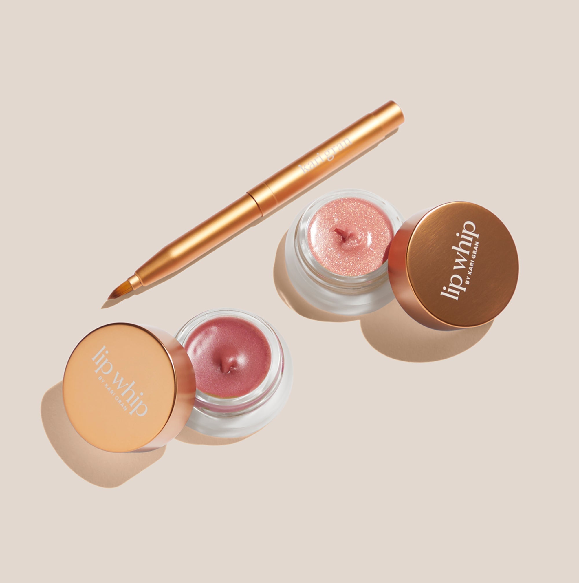 Multiple Kari Gran Lip Whips on beige background