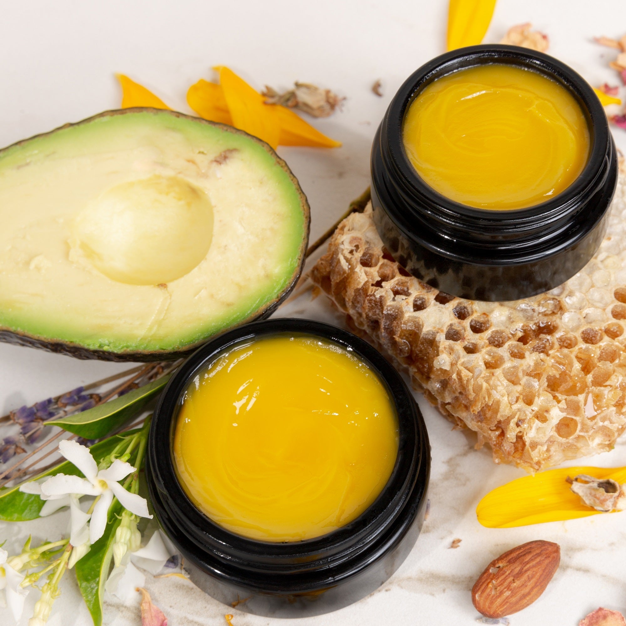 Kari Gran Essential Serum Balms with cut avocado