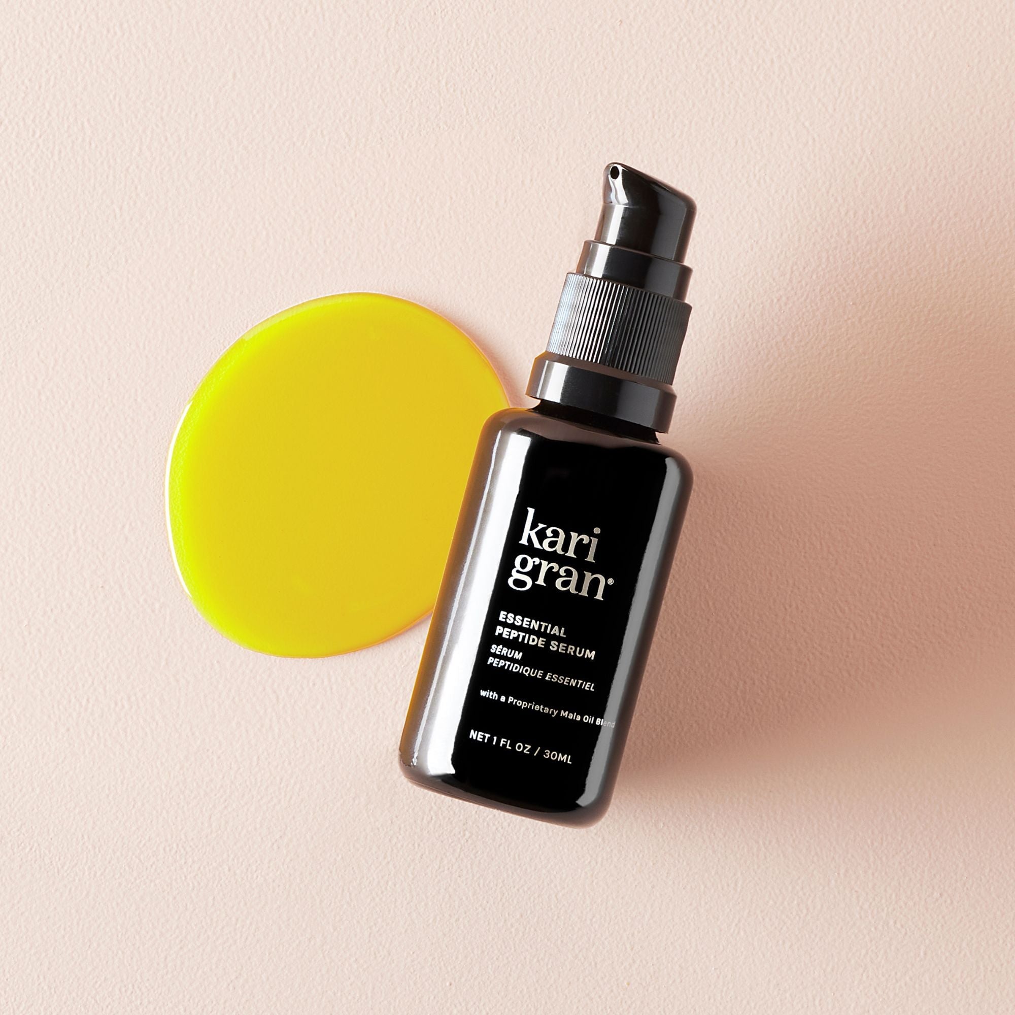 kari gran peptide serum next to an oil swatch