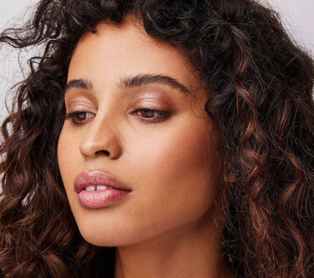 woman showing off makeup