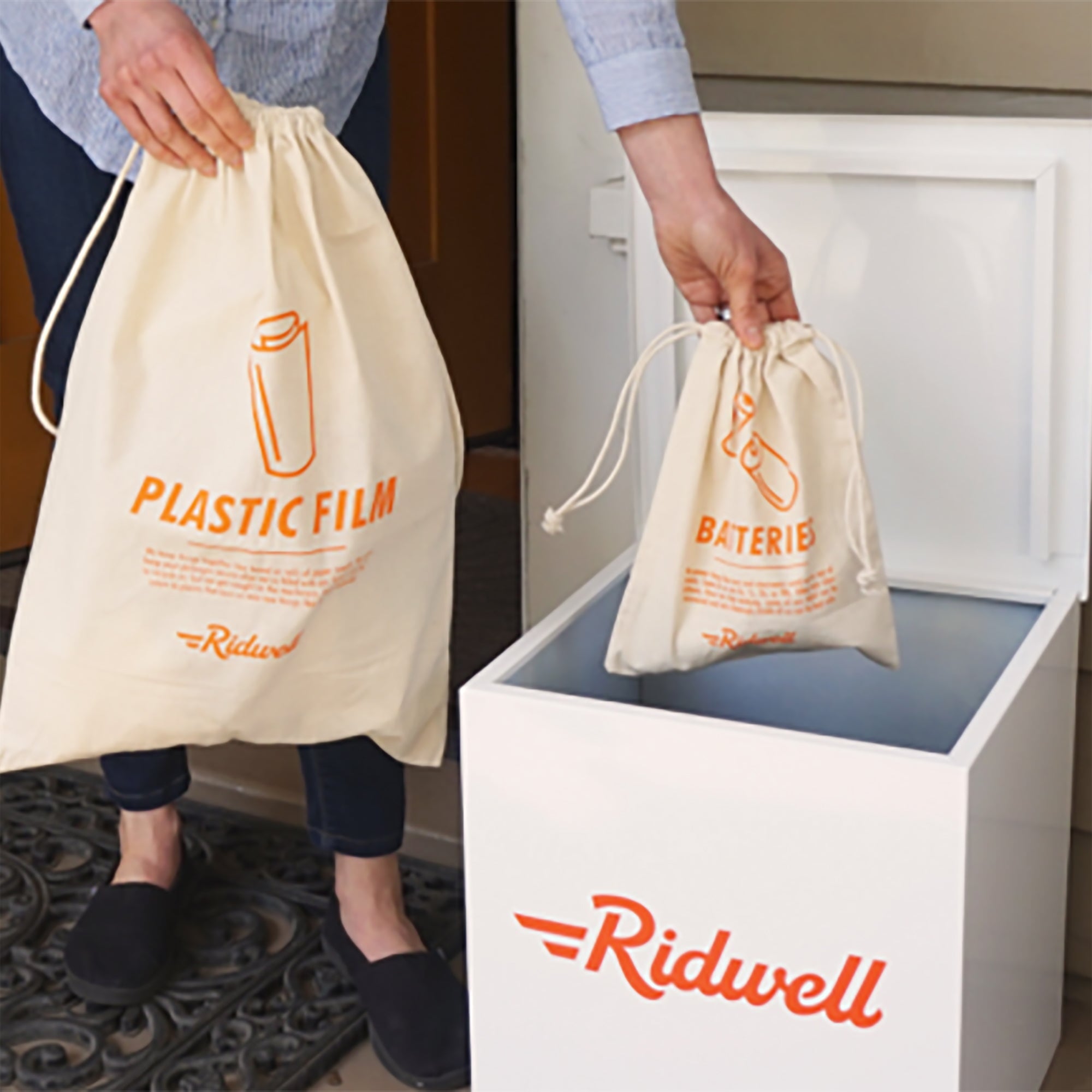 person placing ridwell bags into ridwell bin