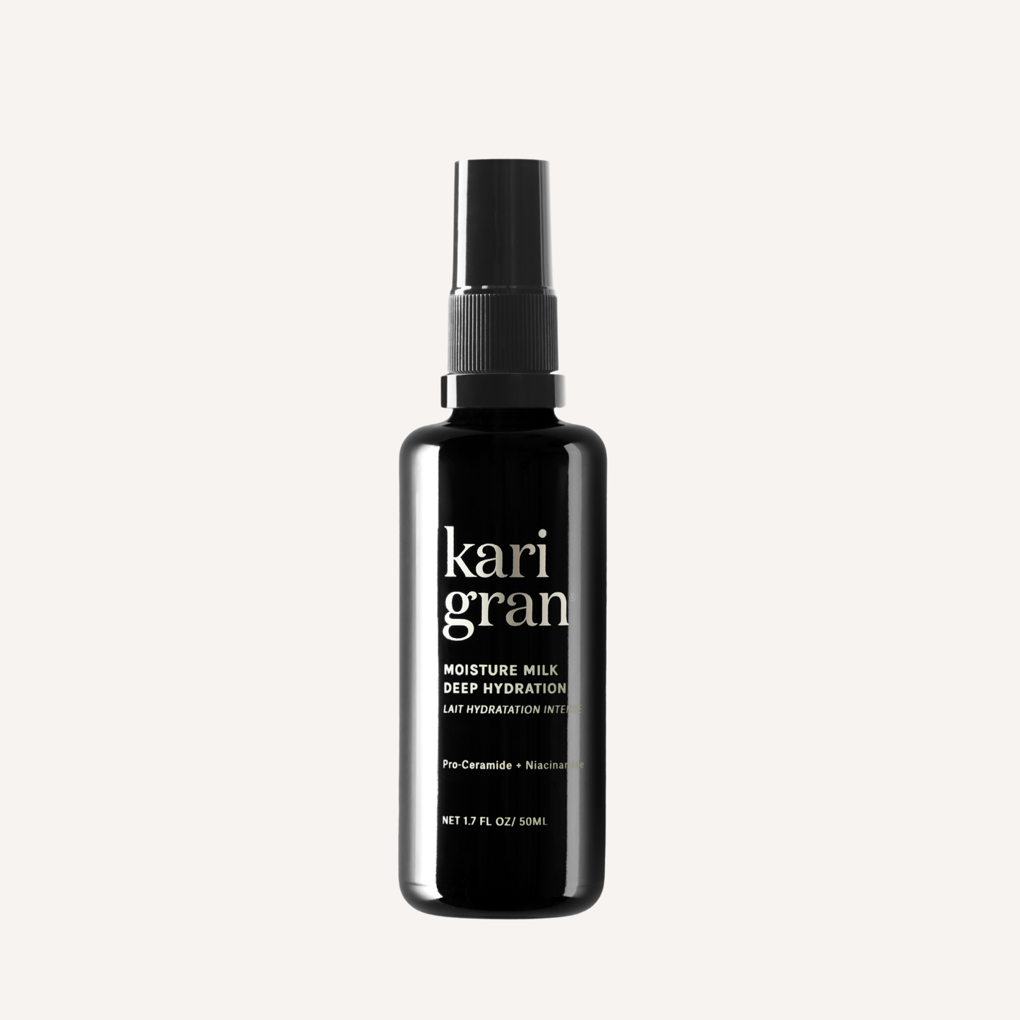 Black bottle of kari gran moisture milk on a white background