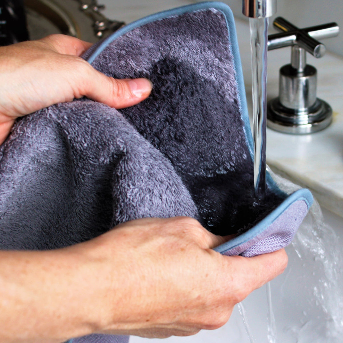exfoliating washcloth being used