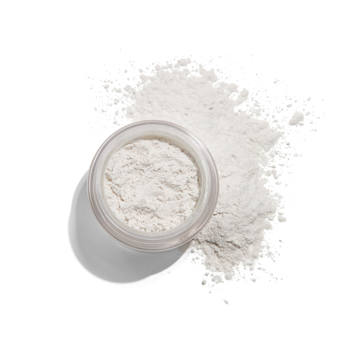 Kari Gran Mineral Setting Powder with extra powder near the jar
