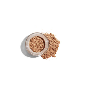 mineral concealer with powder on the side in shade medium