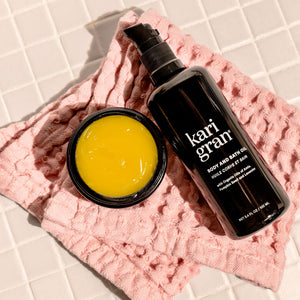 Kari Gran Body and Bath Oil resting on towel
