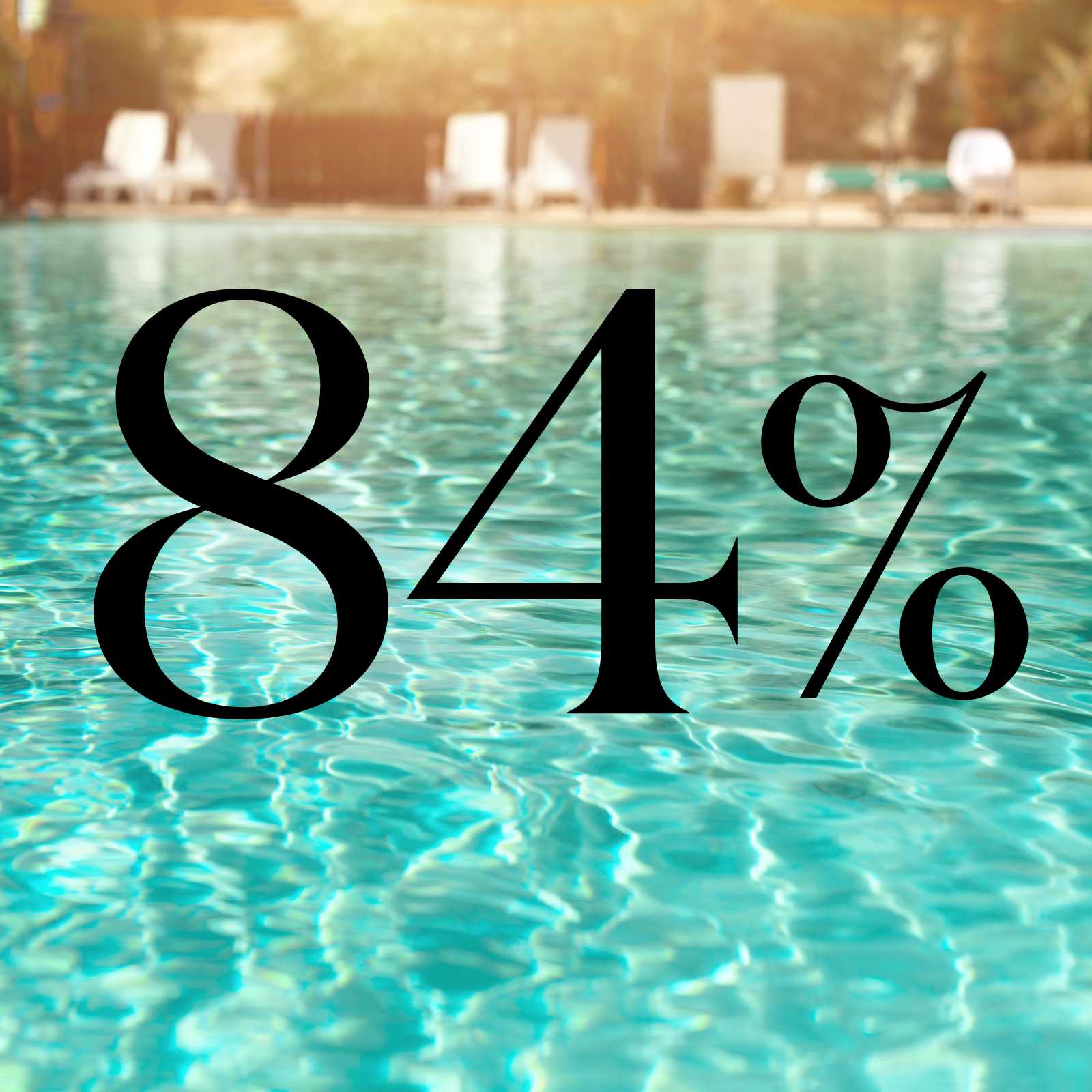 84% written on top of a pool background