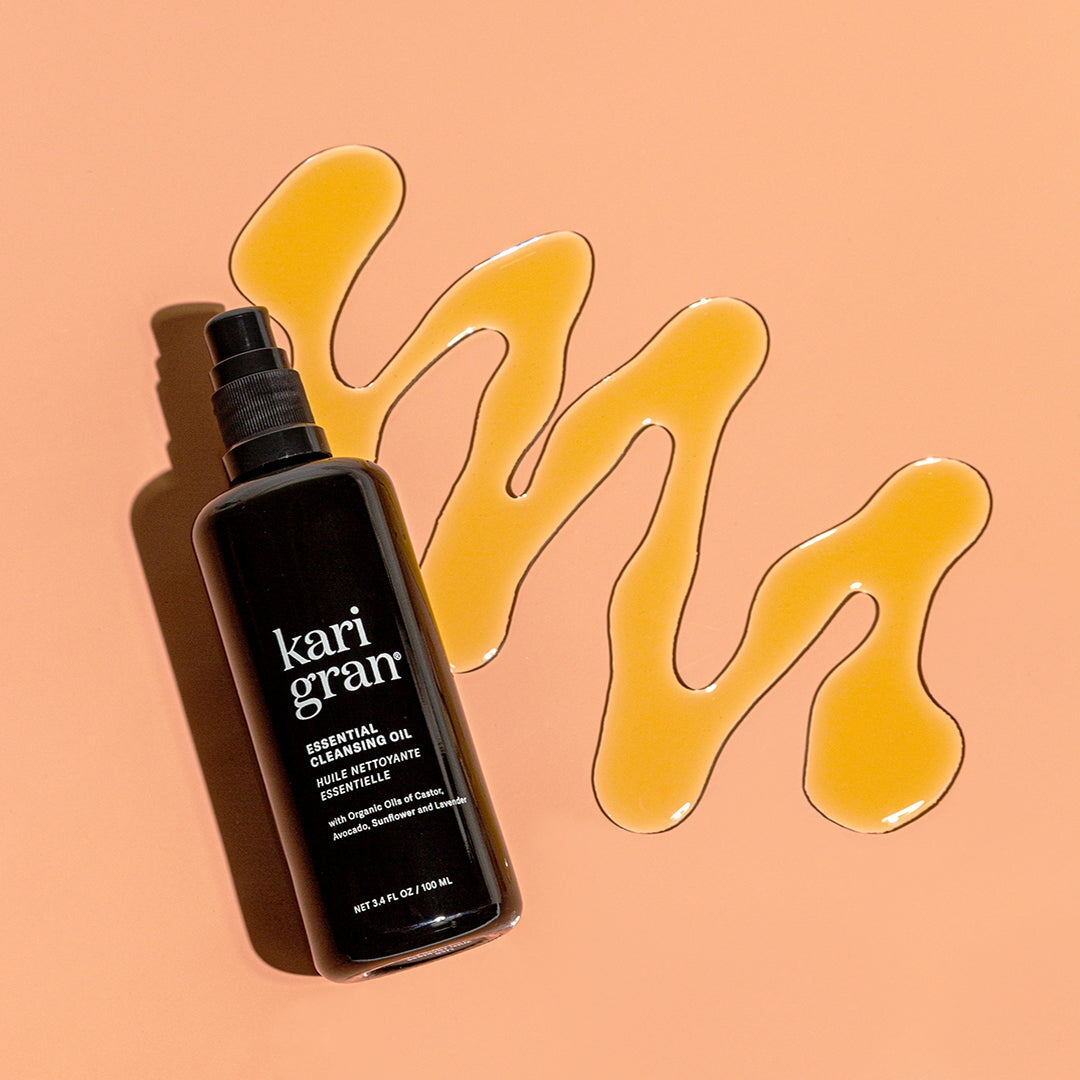 Bottle of Kari gran cleansing oil with oil next to it