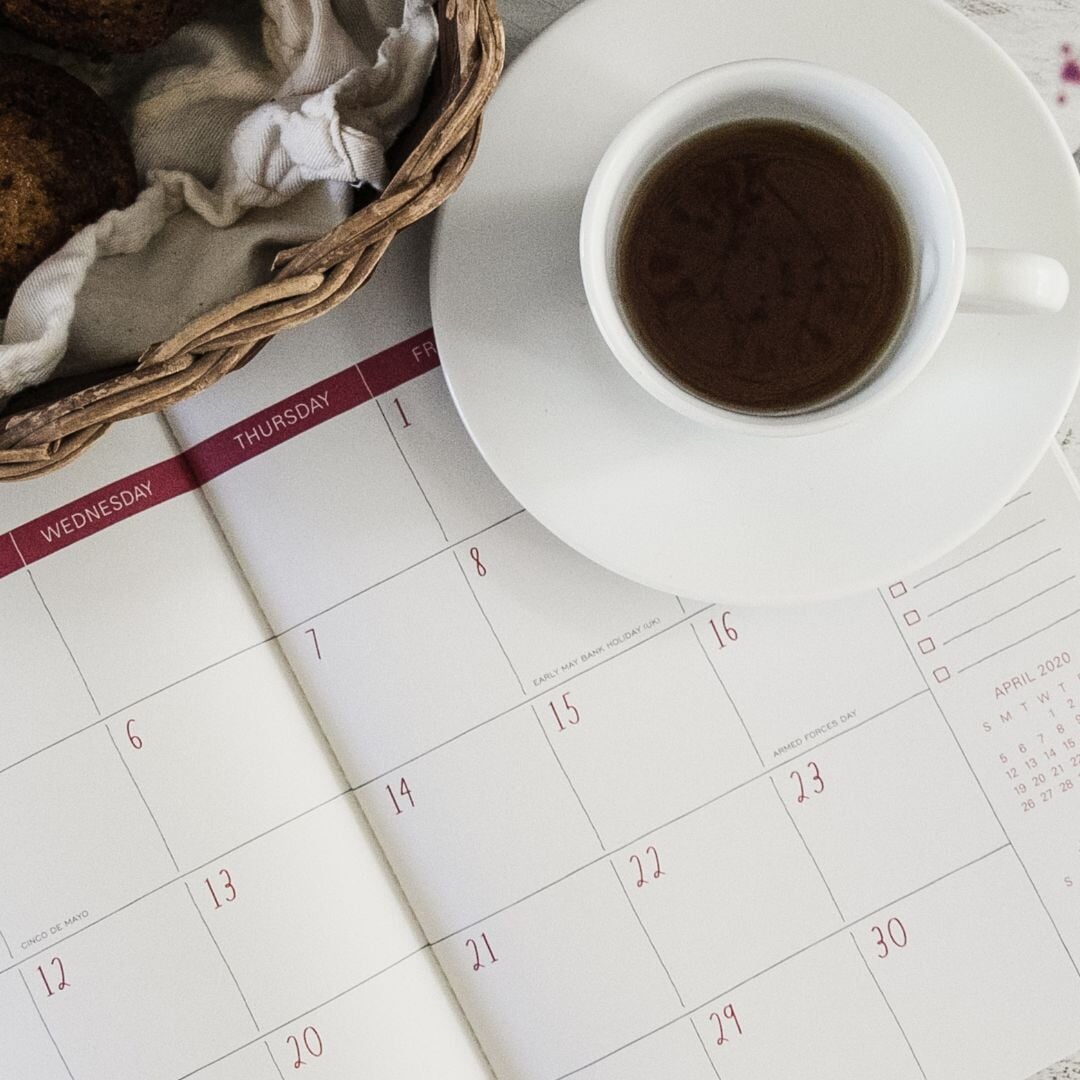 monthly calendar with a coffee cup