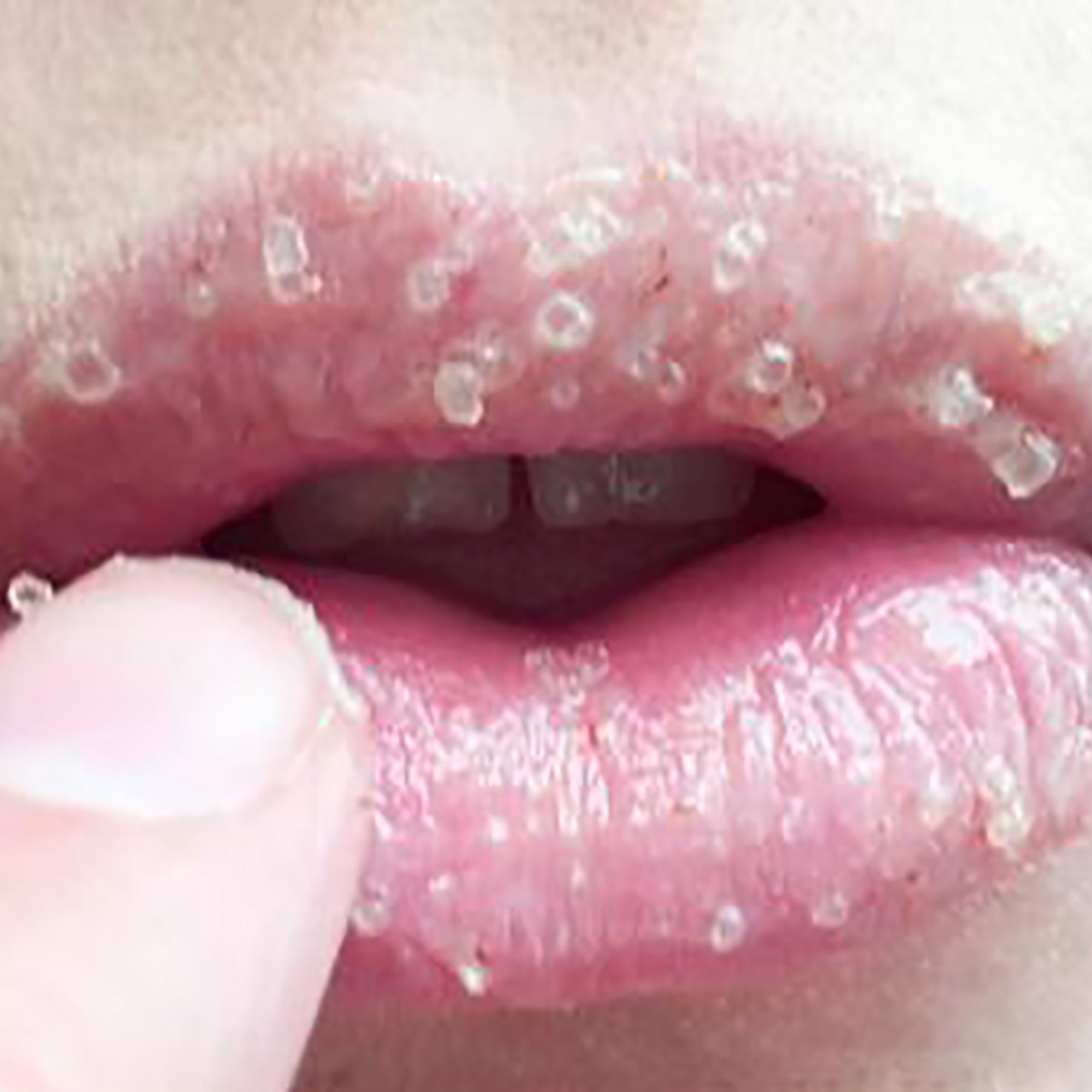woman with lip scrubs on lips