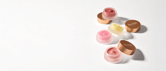 kari gran variety of Lip Whip shades with the tops off to show off color