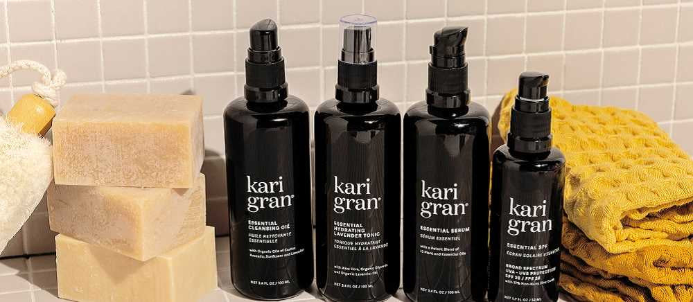 Kari Gran Products in bathroom with bars of soap and yellow towel