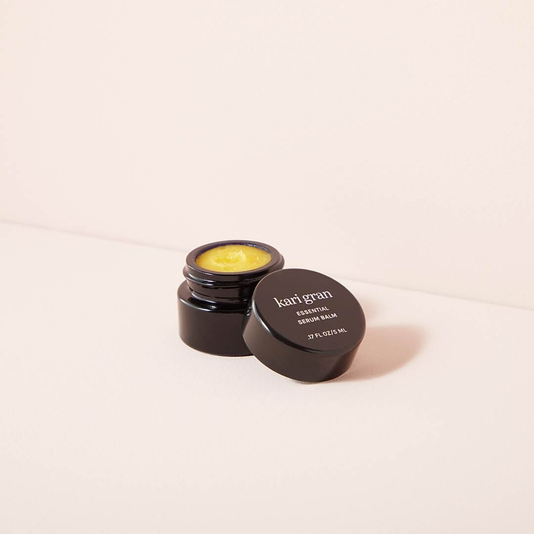 mini essential serum balm with the lid off