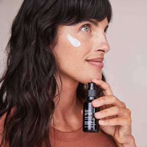 Kari Gran Essential SPF 30 texture on woman's face