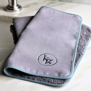 Kari Gran Luxe Exfoliating Washcloth on sink