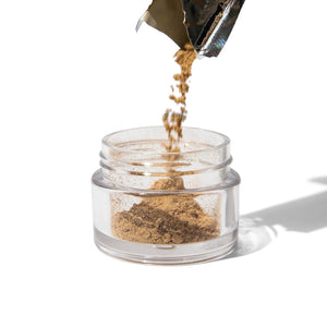 KG Mineral Powder Foundation Refill pouring into jar